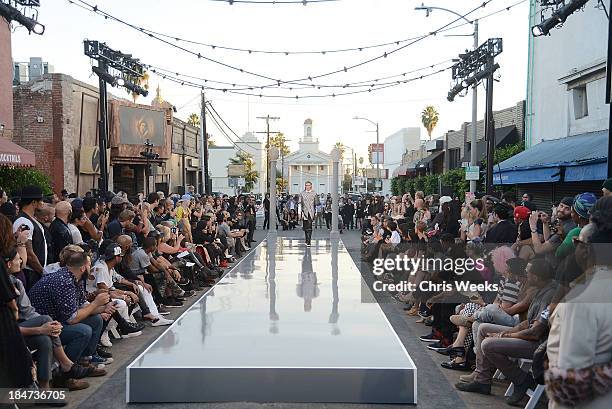 Model walks the runway at the Ashton Michael Spring 2014 Collection show on October 15, 2013 in Hollywood, California.