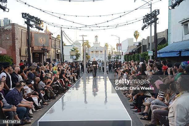 Model walks the runway at the Ashton Michael Spring 2014 Collection show on October 15, 2013 in Hollywood, California.