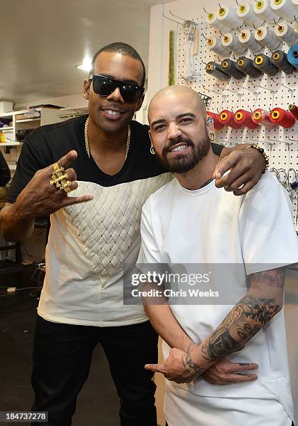 Recording artist Mario and designer Ashton Michael attend the Ashton Michael Spring 2014 Collection show on October 15, 2013 in Hollywood, California.