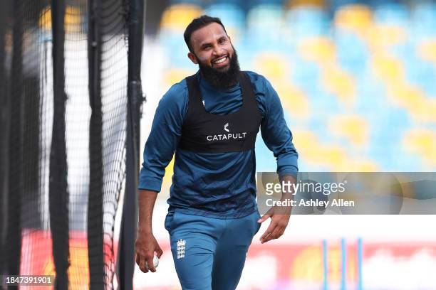 Adil Rashid looks on during an England Net session ahead of the first T20 International between West Indies and England at Kensington Oval on...