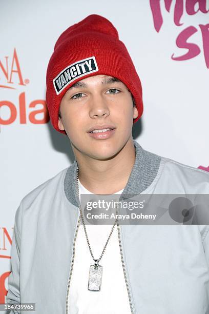 Austin Mahone attends the Aquafina FlavorSplash Launch Party With Austin Mahone & Nick Cannon at Sony Pictures Studios on October 15, 2013 in Culver...