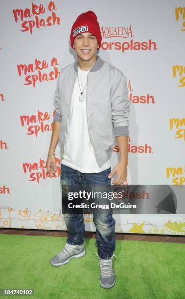 Singer Austin Mahone arrives at the Aquafina FlavorSplash Launch Party at Sony Pictures Studios on October 15, 2013 in Culver City, California.