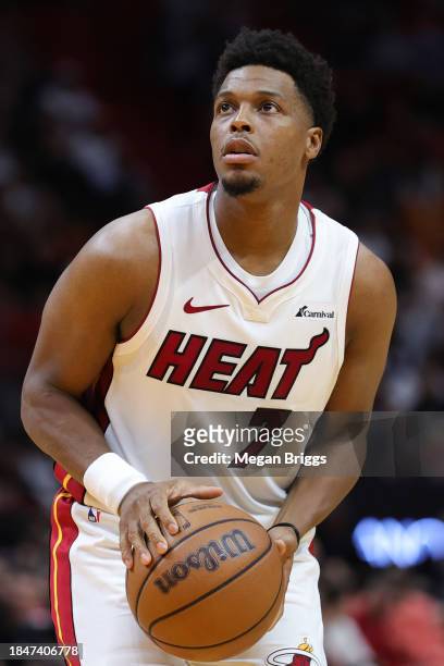 Kyle Lowry of the Miami Heat shoots a free throw against the Indiana Pacers during the second quarter of the game at Kaseya Center on December 02,...