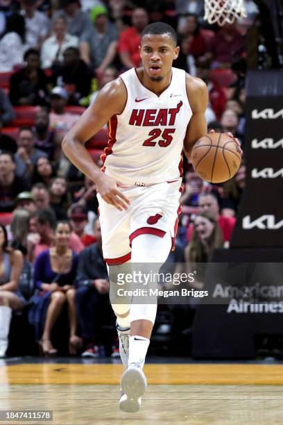 Orlando Robinson of the Miami Heat dribbles the ball against the Indiana Pacers during the first quarter of the game at Kaseya Center on December 02,...