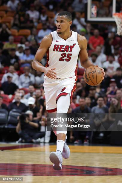 Orlando Robinson of the Miami Heat dribbles the ball against the Indiana Pacers during the first quarter of the game at Kaseya Center on December 02,...
