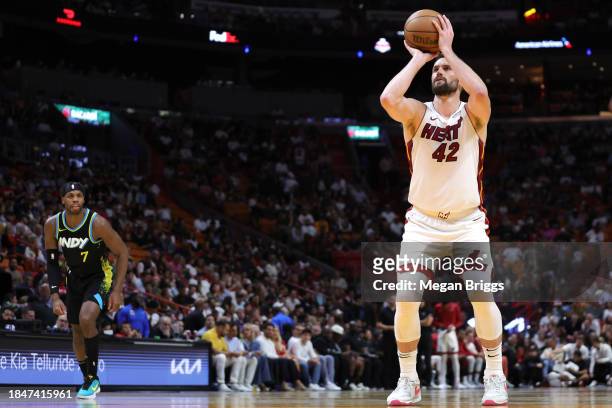 Kevin Love of the Miami Heat shoots a free throw against the Indiana Pacers during the first quarter at Kaseya Center on December 02, 2023 in Miami,...