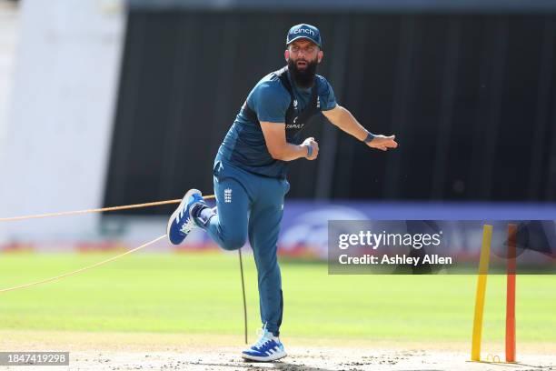 Moeen Ali of England bowls during an England Net session ahead of the first T20i between West Indies and England at Kensington Oval on December 11,...