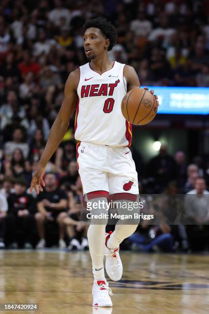 Josh Richardson of the Miami Heat dribbles the ball against the Indiana Pacers during the second quarter at Kaseya Center on December 02, 2023 in...
