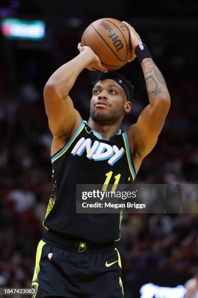 Bruce Brown of the Indiana Pacers shoots a free throw against the Miami Heat during the third quarter of the game at Kaseya Center on December 02,...