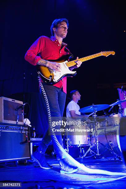 Guitarist Andrew Richards of Hellogoodbye performs on stage at Key Arena on October 15, 2013 in Seattle, Washington.