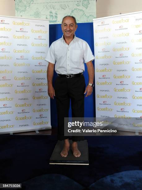 Osvaldo Ardiles leaves his footprints ahead of his visit to the Champions Promenade at Grimaldi Forum on October 16, 2013 in Monte-Carlo, Monaco.