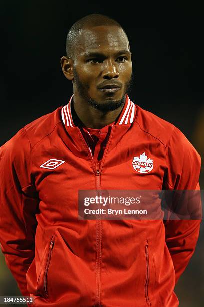 Julian de Guzman of Canada stands for the National Anthems prior to the International Friendly between Canada and Australia at Craven Cottage on...