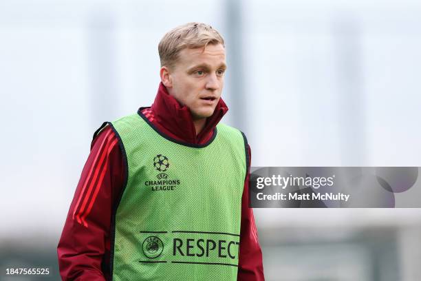 Donny van de Beek of Manchester United looks on during a training session at Carrington Training Ground on December 11, 2023 in Manchester, England.