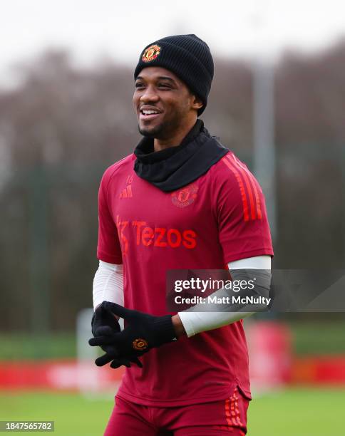 Amad Diallo of Manchester United looks on during a training session at Carrington Training Ground on December 11, 2023 in Manchester, England.