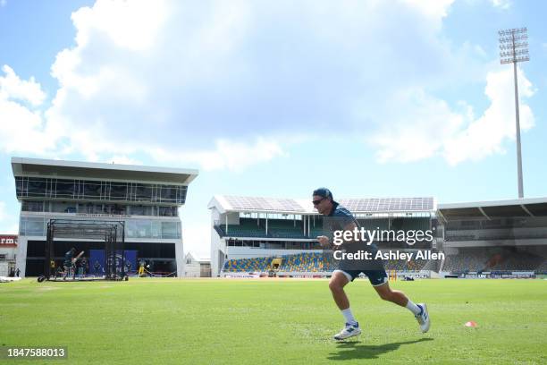 Jos Buttler, sprints during an England Net session ahead of the first T20 international between West Indies and England at Kensington Oval on...