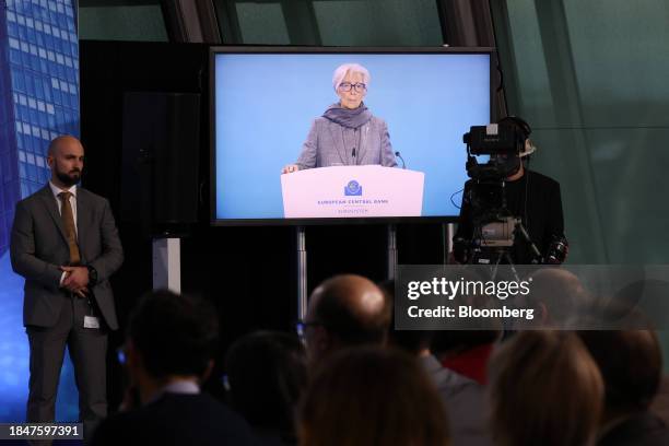 Christine Lagarde, president of the European Central Bank , on a screen at a rates decision news conference in Frankfurt, Germany, on Thursday, Dec....