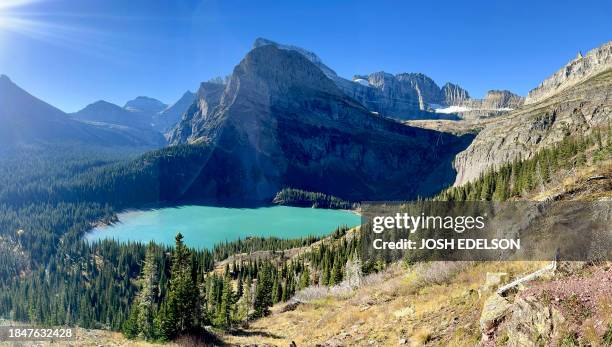 The turquoise waters of Grinnell Lake below the Grinnell Glacier in Glacier National Park, Montana, on October 19, 2023.