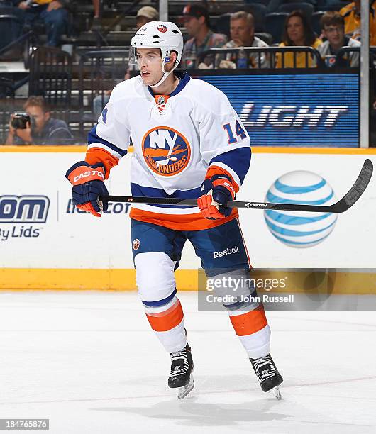 Thomas Hickey of the New York Islanders skates against the Nashville Predators at Bridgestone Arena on October 12, 2013 in Nashville, Tennessee.