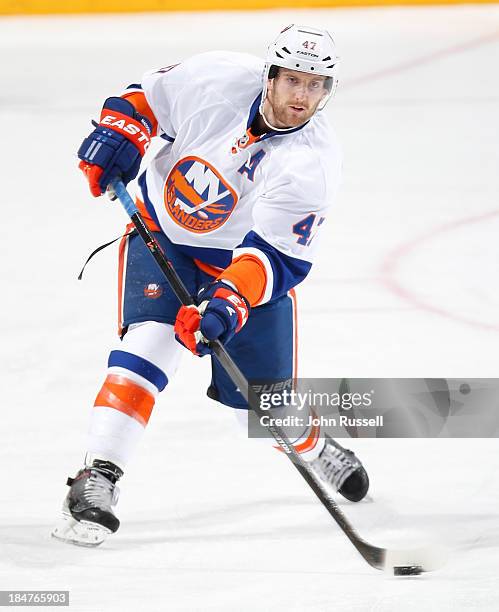 Andrew MacDonald of the New York Islanders skates against the Nashville Predators at Bridgestone Arena on October 12, 2013 in Nashville, Tennessee.