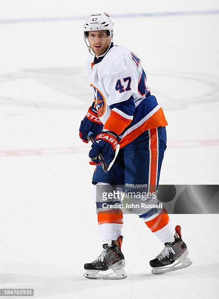 Andrew MacDonald of the New York Islanders skates against the Nashville Predators at Bridgestone Arena on October 12, 2013 in Nashville, Tennessee.