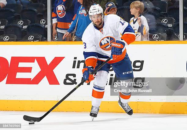 Colin McDonald of the New York Islanders skates warm ups against the Nashville Predators at Bridgestone Arena on October 12, 2013 in Nashville,...