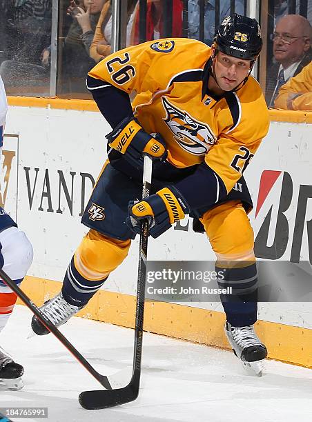 Matt Hendricks of the Nashville Predators skates against of the New York Islanders at Bridgestone Arena on October 12, 2013 in Nashville, Tennessee.