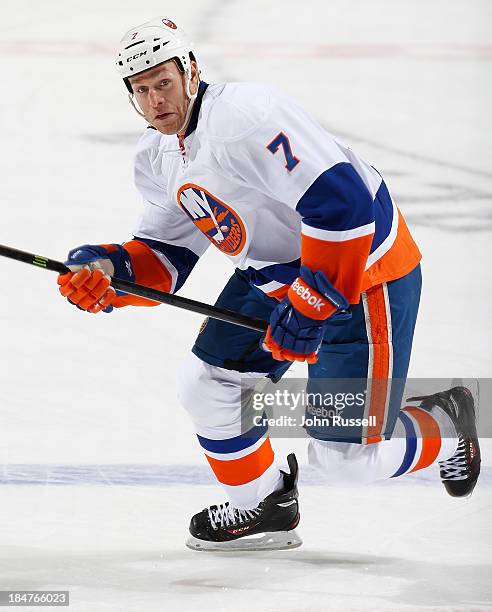 Matt Carkner of the New York Islanders skates against the Nashville Predators at Bridgestone Arena on October 12, 2013 in Nashville, Tennessee.