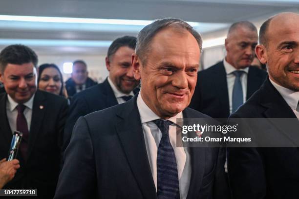 The leader of Civic Coalition , Donald Tusk walks after receiving a majority of votes to be the next Prime minister during a parliament session on...