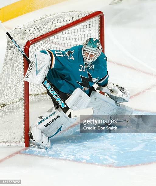 Antti Niemi of the San Jose Sharks defends the net against the New York Rangers during an NHL game on October 8, 2013 at SAP Center in San Jose,...