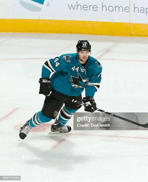 Marc-Edouard Vlasic of the San Jose Sharks skates up the ice against the New York Rangers during an NHL game on October 8, 2013 at SAP Center in San...