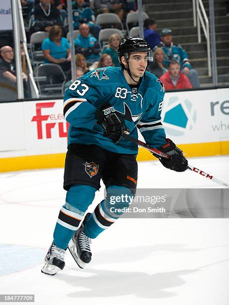 Matthew Nieto of the San Jose Sharks skates after the puck against the New York Rangers during an NHL game on October 8, 2013 at SAP Center in San...