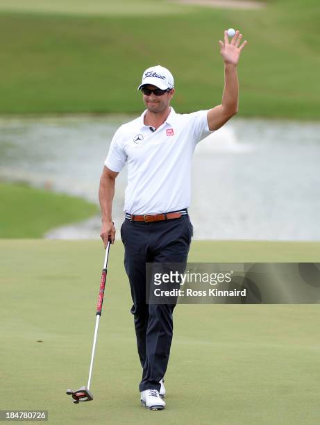Adam Scott of Australia celebrates after making the winning putt during the final round of the PGA Grand Slam of Golf at Port Royal Golf Course on...