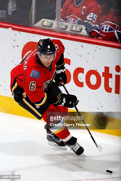 Dennis Wideman of the Calgary Flames skates against the Montreal Canadiens at Scotiabank Saddledome on October 9, 2013 in Calgary, Alberta, Canada....