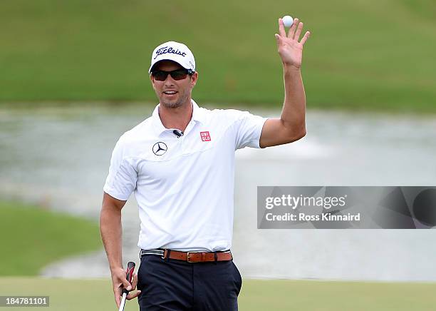 Adam Scott of Australia celebrates after making the winning putt during the final round of the PGA Grand Slam of Golf at Port Royal Golf Course on...