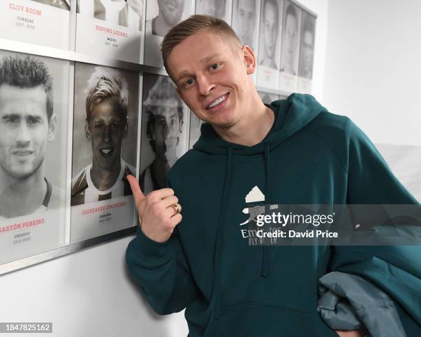 Oleksandr Zinchenko of Arsenal finds a picture of himself on the wall in the PSV stadium during the Arsenal Press Conference at Philips Stadion on...