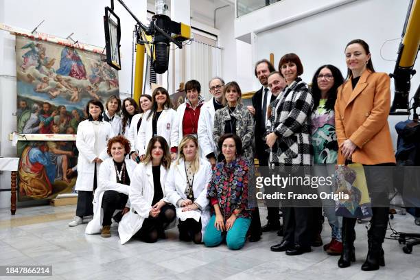 The staff of the Vatican Museums Restoration Laboratory pose during “Beyond the surface. The restorer's gaze": the exhibition initiative promoted by...