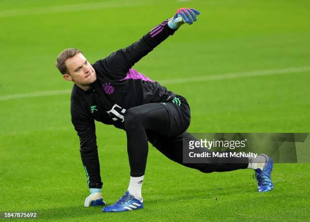 Manuel Neuer of Bayern Munich warms up during a training session at Old Trafford on December 11, 2023 in Manchester, England.