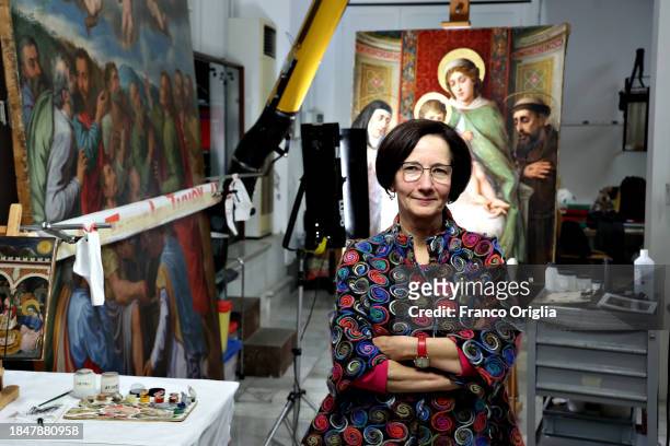 Francesca Persegati, chief restorer of the Vatican Museums Restoration Laboratory poses during “Beyond the surface. The restorer's gaze": the...