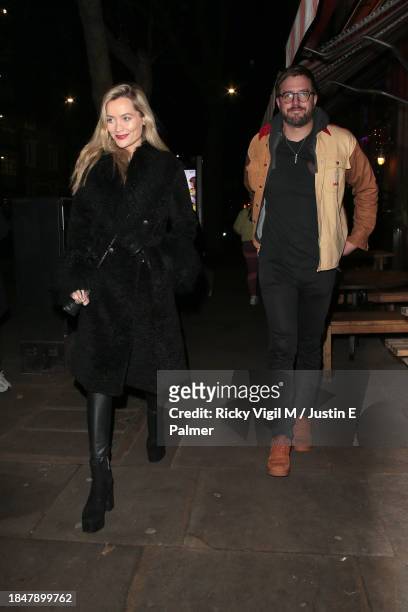 Laura Whitmore and Iain Stirling seen attending Children with Cancer Christmas Quiz at The Kings Arms on December 11, 2023 in London, England.