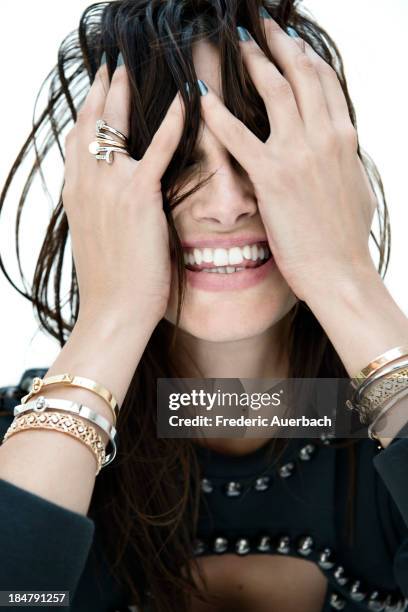 Actress and singer Helena Noguerra is photographed for ELLE France on July 1, 2013 in Paris, France. PUBLISHED IMAGE.