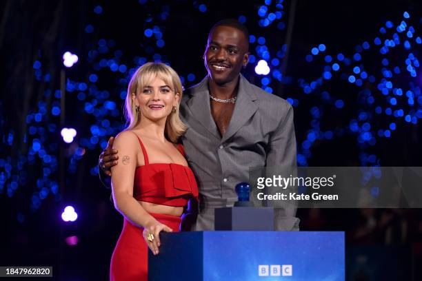 Millie Gibson and Ncuti Gatwa illuminates The London Eye in tribute to his new title role in "Doctor Who" at London Eye on December 11, 2023 in...