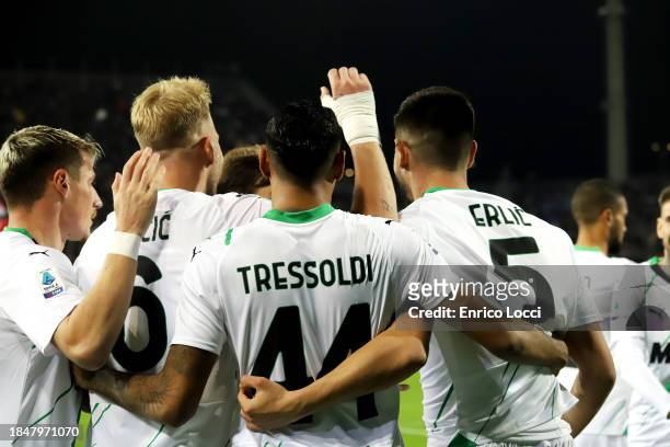 Martin Erlic of Sassuolo celebrates his goal 0-1 with team mates during the Serie A TIM match between Cagliari Calcio and US Sassuolo at Sardegna...