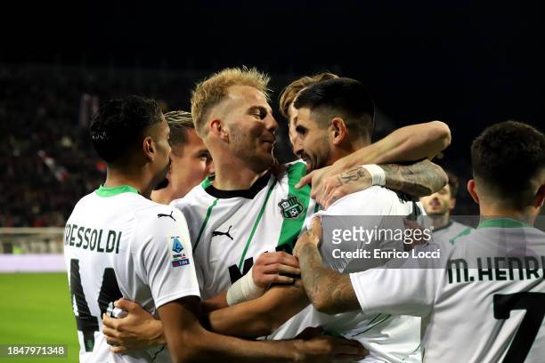 Martin Erlic of Sassuolo celebrates his goal 0-1 with team mates during the Serie A TIM match between Cagliari Calcio and US Sassuolo at Sardegna...