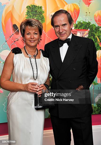 Myriam Ullens and Simon de Pury attend Mimi Foundation "The Power of Love" gala dinner and auction at Sotheby's on October 16, 2013 in London,...