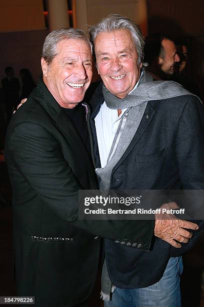 Jean-Claude Darmon and Actor Alain Delon attend the Jean-Paul Moureau book signing for 'Soigner Autrement' at Hotel Park Hyatt Paris Vendome on...