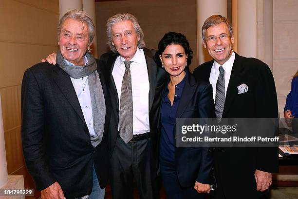 Actor Alain Delon, Jean-Paul Moureau, Rachida Dati and Area Vice president Michel Jauslin attend the Jean-Paul Moureau book signing for 'Soigner...