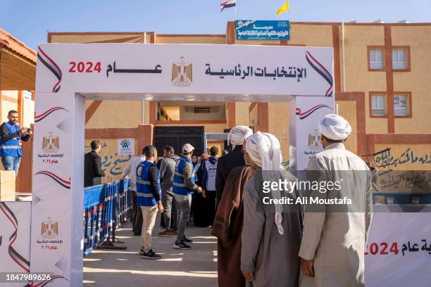 Citizens wait to cast their votes in the presidential elections on December 11, 2023 in Sheikh Zuweid, North Sinai near the Rafah crossing, Egypt....