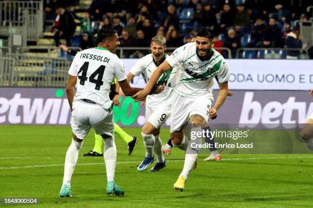 Martin Erlic of Sassuolo celebrates his goal 0-1 with the team mates during the Serie A TIM match between Cagliari Calcio and US Sassuolo at Sardegna...