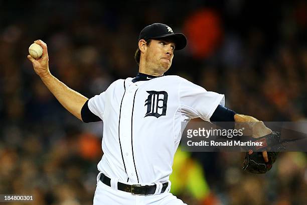 Doug Fister of the Detroit Tigers pitches in the first inning against the Boston Red Sox in the first inning of Game Four of the American League...