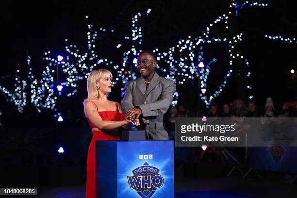 Millie Gibson and Ncuti Gatwa illuminates The London Eye in tribute to his new title role in "Doctor Who" at London Eye on December 11, 2023 in...